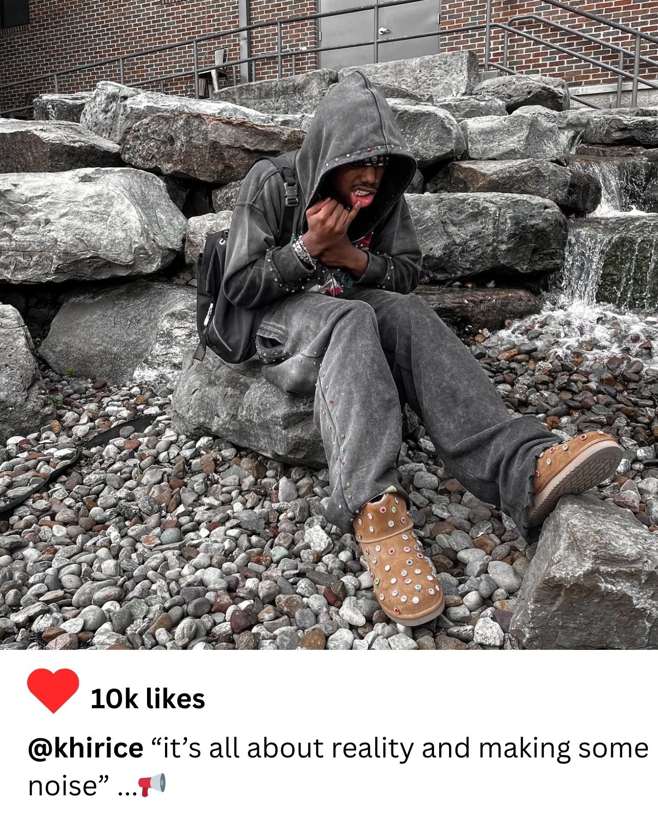 Customer rocking grey FABL3 hoodie in urban streetwear look